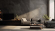 A modern living room with textured wall finishes featuring a black leather sofa, a shag rug