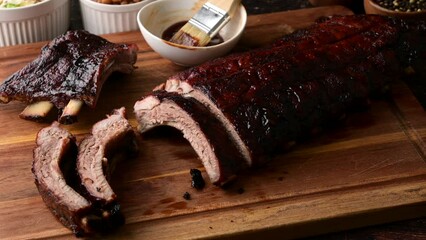 Poster - sliced barbeque spare ribs on wooden board