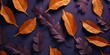 pattern of dry orange metallic leaves on violet 