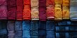 Colorful towels rolled up neatly showcasing a rich and inviting texture