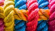 Team rope diverse strength connect partnership together teamwork unity communicate support. Strong diverse network rope team concept integrate braid color background cooperation empower power.Team rop