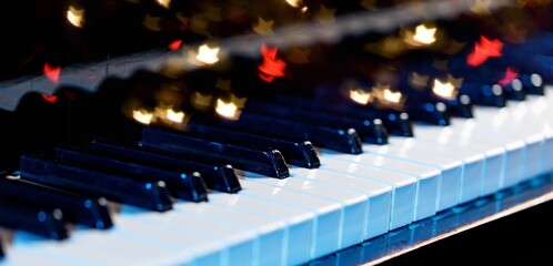 Sticker - Piano keys background with bokeh. Musical instrument