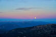 The moon in twilight in the Austrian Alps