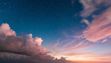 Wall Mural - close up of twilight sky with pink clouds and stars