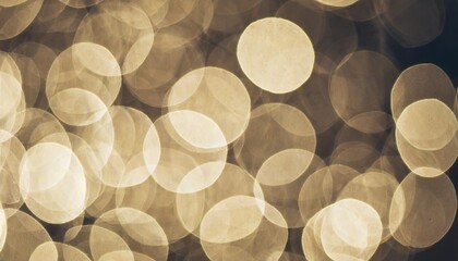 Wall Mural - abstract bokeh background beige colored natural flare from lights beige monochromatic vertical photo with optical effect blurred bokeh texture as holiday backdrop celebration screensaver