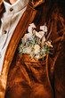 Brown velvet jacket with floral pocket