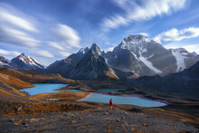 Single traveler in the epic mountain landscape of the Peruvian andes.