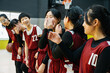 © ZQZ Studio/Stocksy - Portrait of basketball girls laughing in a gym