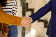 © Oleksii Syrotkin/Stocksy - Successful Client Employee Agreement Handshake
