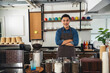 © aFotostock - Portrait barista Asian man coffee shop owner smiling look at camera small business confident person Entrepreneur manager professional men standing coffee counter bar. Barista small business Owner