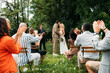 © Studio Firma/Stocksy - Summer Wedding Gathering