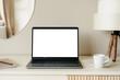 © DZ FILM/Stocksy - Laptop with a white screen in the home interior