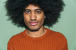 © Basil Pind/Stocksy - male portrait with afro hairstyle