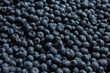 © Yaroslav Danylchenko/Stocksy - Close-up background with fresh blueberries.
