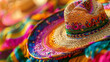 Close-up of a colorful Mexican sombrero, showcasing the intricate patterns and vivid hues of traditional Mexican craftsmanship.