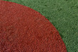© Rialto Images/Stocksy - Close up of artificial turf sports field