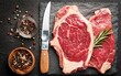 Raw steak Ribeye entrecote on vintage stone background. top view