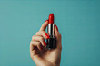 Elegant Red Lipstick Fashion Statement in Hand - Cosmetics Banner Design