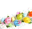 Collection of stylish colors eggs with flowers for Easter celebration on white background.