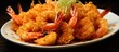 A white plate sits on top of a table, holding crispy fried shrimp as a delectable side dish.