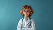 Portrait of a kid dressed in a doctor's white coat and stethoscope. A happy child who is looking thoughtful with a studio background, conceptual of imagination and dream career, free copy space