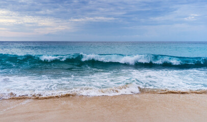 Wall Mural - Ocean waves on the beach background