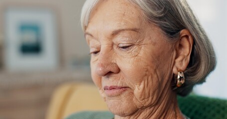 Wall Mural - Face, thinking or memory with senior woman on sofa of living room in home to relax for retirement. Peace, wellness or nostalgia with elderly person closeup in apartment for break, rest or time off