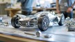 Mechanical engineers design models of future electric cars.
