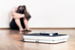 © terovesalainen - Weight loss and diet. Sad woman and scale. Stress of fail or being obese. Anorexia or bulimia concept. Frustrated teenager with eating disorder. Gaining body fat problem. Low confidence or trauma.
