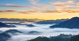 Fototapeta Na ścianę - The Transformative Beauty of Sunrise Piercing Through Morning Fog in the Valley