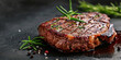 closeup juicy beef steak with rosemary on wooden surface. appetizing grilled beef with copy space, fried meat restaurant concept