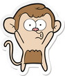 sticker of a cartoon surprised monkey