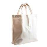 Fototapeta  - A white canvas bag with a gold trim Isolated on transparent background, PNG