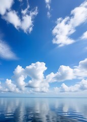 Sticker - blue sky with white cloud background, the clouds and sky reflect on the calm sea surface