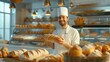 Baker prepares fresh bread in the bakery for sale in shop