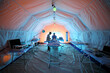 © Pavel Losevsky - Medical worker and a student near the lying dummy inside the tent in a field hospital