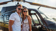 © Studio Zenith - couple avec lunettes de soleil posant devant un hélicoptère