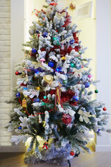 Christmas tree with illumination, vintage toys at room