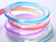 Colorful glassy swirls creating a fluid motion in 3D abstract rendering