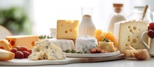 Cheese Types And Milk On A Bright White Kitchen Background