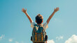 Young Boy with Arms Raised Towards the Sky, Feeling of Freedom and Joy