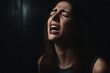 © useful pictures - Beautiful face of sad woman screaming crying desperate and depressed with tears on her eyes suffering pain and depression isolated on black background in sadness facial expression and emotion concept