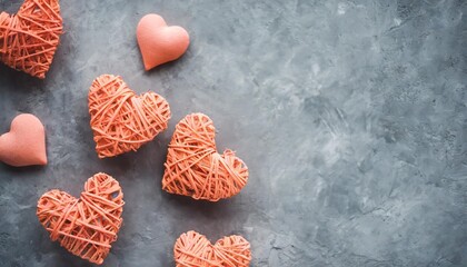 Wall Mural - coral hearts on a gray concrete background flat lay top view copy space square valentine s day