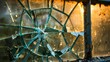A close-up of a metal-plastic window with its glass shattered by vandals