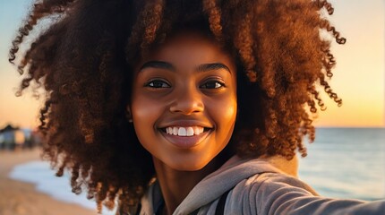 Wall Mural - Happy young african american woman taking selfie on ocean shore, Happy female tourist smiling at camera outside. Tourist traveling to tropical countries, woman taking selfie on the seashore