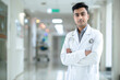 Portrait of a handsome young Indian male doctor with stethoscope
