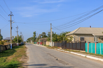 Wall Mural - Road in the village. Background with selective focus and copy space