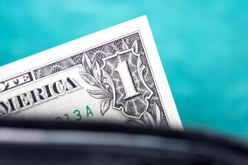 Wall Mural - Wallet and close-up of dollar bills