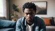 Angry frustrated black african young male man staring at the camera on a living room home background from Generative AI