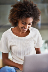 Canvas Print - Laptop, smile and adult education with black woman in living room of home for education, learning or study. Computer, video and virtual class with happy young student in apartment for research